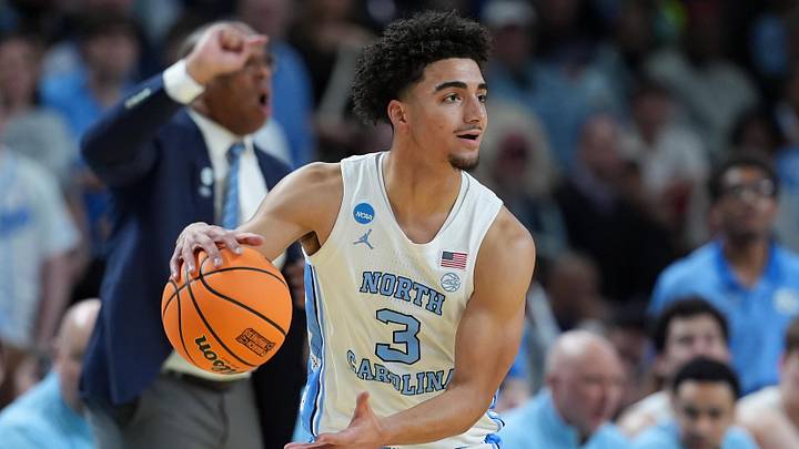 Mar 19, 2026; Greenville, SC, USA; North Carolina Tar Heels guard Derek Dixon (3) dribbles the ball against the VCU Rams in the first half of a first round game of the men's 2026 NCAA Tournament at Bon Secours Wellness Arena. Mandatory Credit: Jim Dedmon-Imagn Images