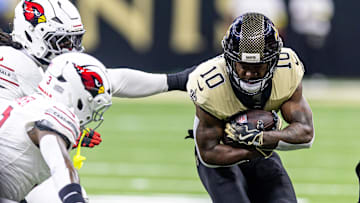 Sep 7, 2025; New Orleans, Louisiana, USA; New Orleans Saints wide receiver Brandin Cooks (10) is tackled by the Arizona Cardinals during the second half at Caesars Superdome. Mandatory Credit: Stephen Lew-Imagn Images