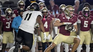Nov 1, 2025; Tallahassee, Florida, USA; Florida State Seminoles wide receiver Duce Robinson (0) runs with the ball during the first half against the Wake Forest Demon Deacons at Doak S. Campbell Stadium. Mandatory Credit: Melina Myers-Imagn Images
