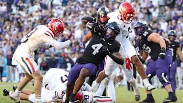 Nov 23, 2024; Fort Worth, Texas, USA; TCU Horned Frogs running back Cam Cook (4) scores a touchdown against the Arizona Wildcats in the third quarter at Amon G. Carter Stadium. Mandatory Credit: Tim Heitman-Imagn Images