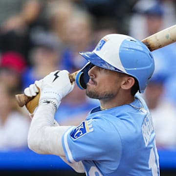May 16, 2025; Kansas City, Missouri, USA; Kansas City Royals designated hitter Cavan Biggio (18) hits a double during the second inning against the St. Louis Cardinals at Kauffman Stadium. Mandatory Credit: Jay Biggerstaff-Imagn Images