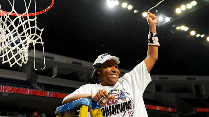 Mar 10, 2013; Duluth, GA, USA; Texas A&M Aggies center Kelsey Bone (3) cuts down the net after winning the SEC championship against the Kentucky Wildcats during the championship game for the SEC tournament at The Arena at Gwinnett Center. Texas A&M defeated Kentucky 75-67. Mandatory Credit: Dale Zanine-Imagn Images Mar 10, 2013; Duluth, GA, USA; Texas A&M Aggies center Kelsey Bone (3) cuts down the net after winning the SEC championship against the Kentucky Wildcats during the championship game for the SEC tournament at The Arena at Gwinnett Center. Texas A&M defeated Kentucky 75-67. Mandatory Credit: Dale Zanine-Imagn Images