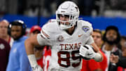 Jan 10, 2025; Arlington, TX, USA; Texas Longhorns tight end Gunnar Helm (85) in action during the game between the Texas Longhorns and the Ohio State Buckeyes at AT&T Stadium. Mandatory Credit: Jerome Miron-Imagn Images