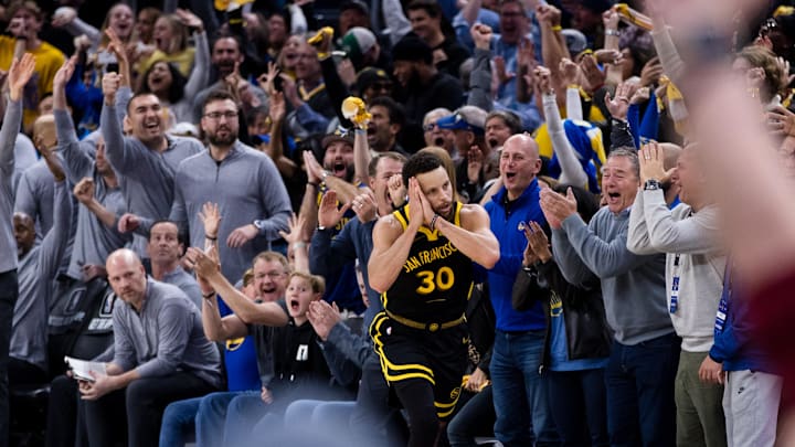 Dec 19, 2023; San Francisco, California, USA; Golden State Warriors guard Stephen Curry (30) reacts after scoring against the Boston Celtics during the overtime period at Chase Center. Mandatory Credit: John Hefti-Imagn Images