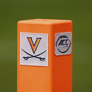 Nov 5, 2022; Charlottesville, Virginia, USA; A detailed view of the Virginia Cavaliers and ACC logos on the end zone pylon used during the game between the Virginia Cavaliers and the North Carolina Tar Heels at Scott Stadium. Mandatory Credit: Scott Taetsch-Imagn Images