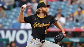 Apr 24, 2025; Anaheim, California, USA;  Pittsburgh Pirates starting pitcher Carmen Mlodzinski (50) pitches during the first inning against the Los Angeles Angels at Angel Stadium. Mandatory Credit: Kiyoshi Mio-Imagn Images