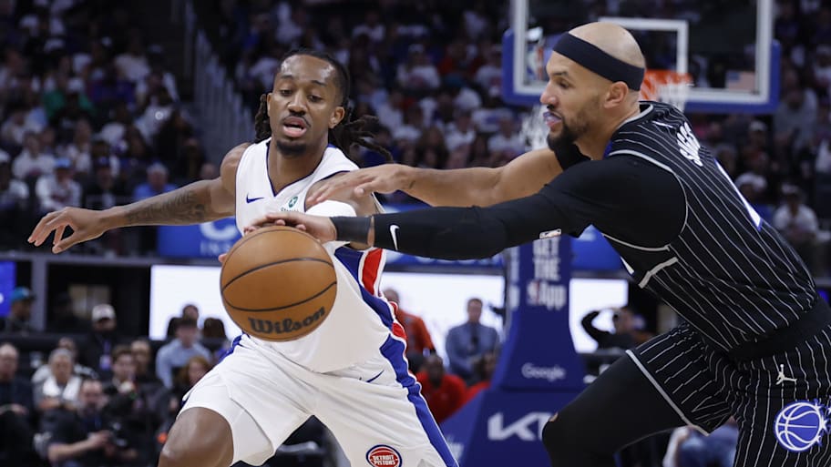 Magic guard Jalen Suggs knocks the ball from Pistons guard Daniss Jenkins.