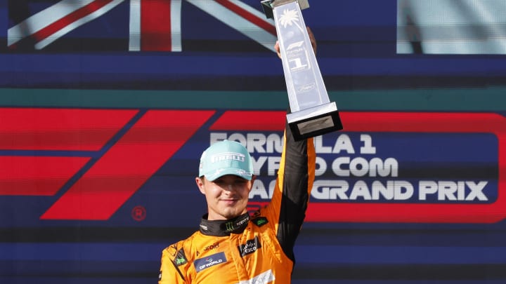 May 5, 2024; Miami Gardens, Florida, USA; McLaren driver Lando Norris (4) poses with the race trophy after winning the Miami Grand Prix at Miami International Autodrome. Mandatory Credit: Peter Casey-USA TODAY Sports