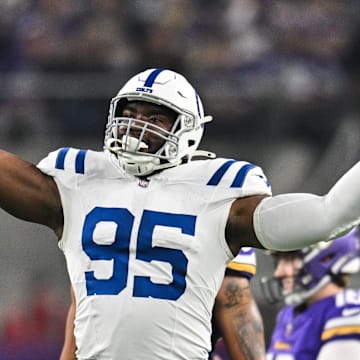 Nov 3, 2024; Minneapolis, Minnesota, USA; Indianapolis Colts defensive tackle Adetomiwa Adebawore (95) reacts after a missed field goal by Minnesota Vikings place kicker Will Reichard (16) during the second quarter at U.S. Bank Stadium. Mandatory Credit: Jeffrey Becker-Imagn Images