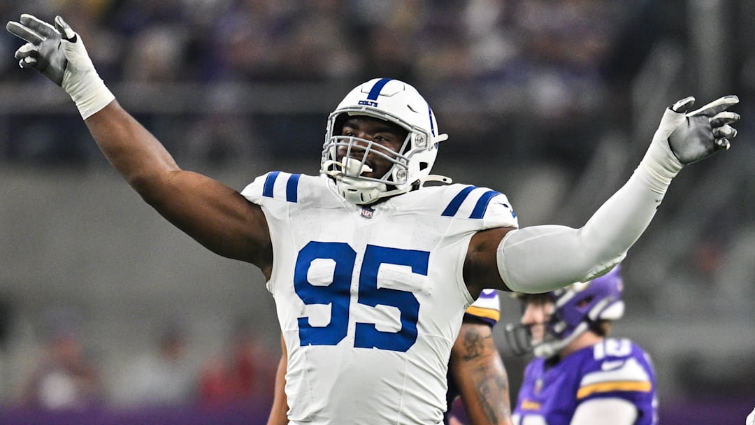 Nov 3, 2024; Minneapolis, Minnesota, USA; Indianapolis Colts defensive tackle Adetomiwa Adebawore (95) reacts after a missed field goal by Minnesota Vikings place kicker Will Reichard (16) during the second quarter at U.S. Bank Stadium. Mandatory Credit: Jeffrey Becker-Imagn Images