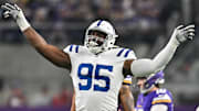 Nov 3, 2024; Minneapolis, Minnesota, USA; Indianapolis Colts defensive tackle Adetomiwa Adebawore (95) reacts after a missed field goal by Minnesota Vikings place kicker Will Reichard (16) during the second quarter at U.S. Bank Stadium. Mandatory Credit: Jeffrey Becker-Imagn Images