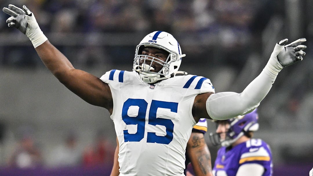 Nov 3, 2024; Minneapolis, Minnesota, USA; Indianapolis Colts defensive tackle Adetomiwa Adebawore (95) reacts after a missed field goal by Minnesota Vikings place kicker Will Reichard (16) during the second quarter at U.S. Bank Stadium. Mandatory Credit: Jeffrey Becker-Imagn Images