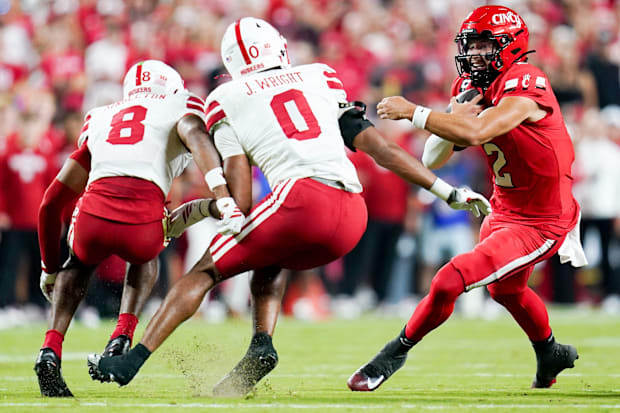 Cincinnati Bearcats quarterback Brendan Sorsby runs the ball against Nebraska