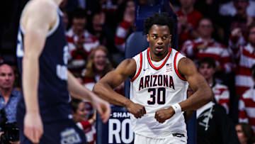 Nov 9, 2024; Tucson, Arizona, USA;  Arizona Wildcats forward Tobe Awaka (30) celebrates his dunk during the first half against the Old Dominion Monarchs at McKale Center. Mandatory Credit: Aryanna Frank-Imagn Images