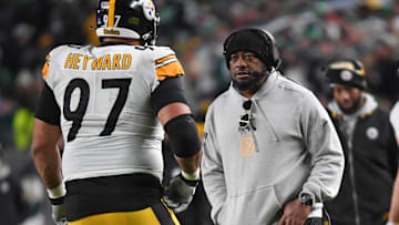 Dec 15, 2024; Philadelphia, Pennsylvania, USA; Pittsburgh Steelers head c coach Mike Tomlin talks with Pittsburgh Steelers defensive tackle Cameron Heyward (97) against the Philadelphia Eagles during the second quarter at Lincoln Financial Field. Mandatory Credit: Eric Hartline-Imagn Images