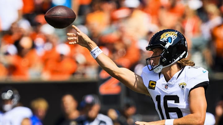 Sep 14, 2025; Cincinnati, Ohio, USA; Jacksonville Jaguars quarterback Trevor Lawrence (16) throws a pass against the Cincinnati Bengals in the first half at Paycor Stadium. Mandatory Credit: Katie Stratman-Imagn Images