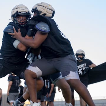 El Paso Franklin’s Justin Morales, left, works on drills with his teammates at football practice on Wednesday morning, Aug. 14, 2024. Morales is one of the top returning linemen in 2025.