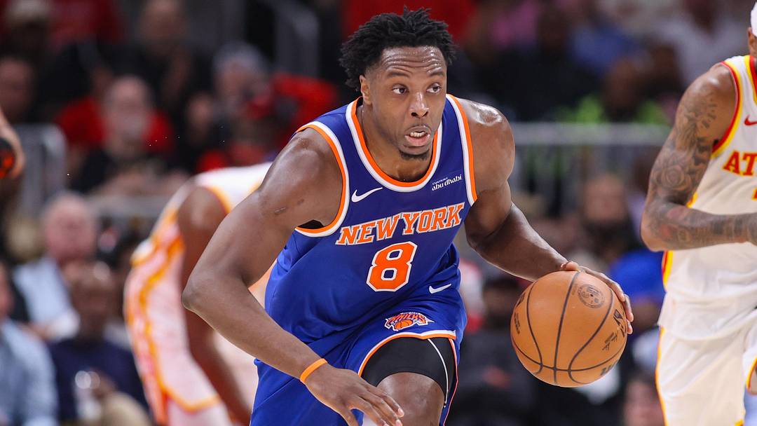New York Knicks forward Og Anunoby (8) dribbles against the Atlanta Hawks in the second quarter during game six of the first round of the 2026 NBA Playoffs at State Farm Arena.