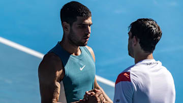 Jan 17, 2025; Melbourne, Victoria, Australia; Carlos Alcaraz of Spain and Nuno Borges of Portugal shake hands after their match in the third round of the men's singles at the 2025 Australian Open at Melbourne Park. Mandatory Credit: Mike Frey-Imagn Images