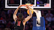 Nov 16, 2025; Birmingham, Alabama, USA; Houston Cougars forward Joseph Tugler (11) dunks the ball during the second half against the Auburn Tigers at Legacy Arena at BJCC. Mandatory Credit: David Leong-Imagn Images