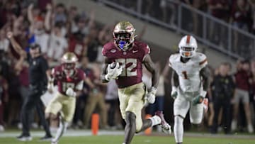 Oct 4, 2025; Tallahassee, Florida, USA; Florida State Seminoles running back Ousmane Kromah (32) runs during the first half against the Miami Hurricanes at Doak S. Campbell Stadium. Mandatory Credit: Melina Myers-Imagn Images