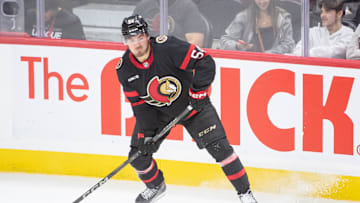 Sep 26, 2024; Ottawa, Ontario, CAN; Ottawa Senators right wing Tyler Boucher (54) controls the puck in the third period against the Buffalo Sabres at the Canadian Tire Centre. Mandatory Credit: Marc DesRosiers-Imagn Images