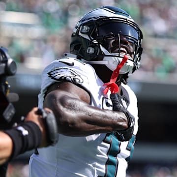 Sep 21, 2025; Philadelphia, Pennsylvania, USA; Philadelphia Eagles wide receiver AJ. Brown (11) reacts after scoring a touchdown against the Los Angeles Rams during the first half at Lincoln Financial Field. Mandatory Credit: Bill Streicher-Imagn Images