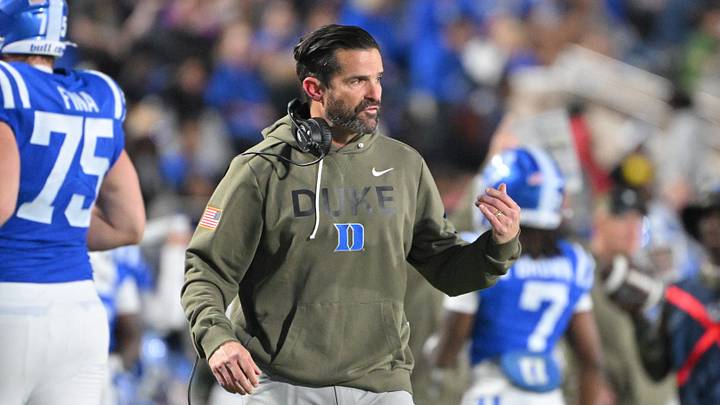 Nov 15, 2025; Durham, North Carolina, USA;  Duke Blue Devils head coach Manny Diaz reacts during the third quarter against the Virginia Cavaliers at Wallace Wade Stadium. Mandatory Credit: Zachary Taft-Imagn Images