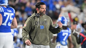 Nov 15, 2025; Durham, North Carolina, USA;  Duke Blue Devils head coach Manny Diaz reacts during the third quarter against the Virginia Cavaliers at Wallace Wade Stadium. Mandatory Credit: Zachary Taft-Imagn Images