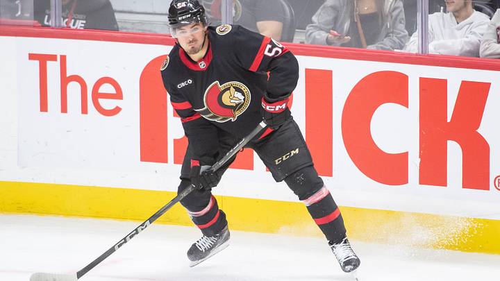 Sep 26, 2024; Ottawa, Ontario, CAN; Ottawa Senators right wing Tyler Boucher (54) controls the puck in the third period against the Buffalo Sabres at the Canadian Tire Centre. Mandatory Credit: Marc DesRosiers-Imagn Images