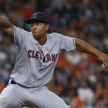 May 24, 2022; Houston, Texas, USA; Cleveland Guardians relief pitcher Anthony Gose (26) pitches during the game against the Houston Astros at Minute Maid Park.