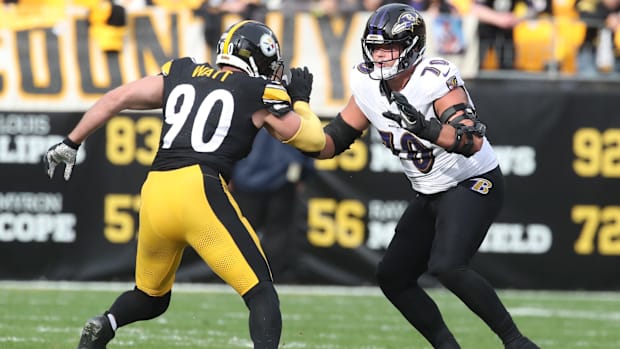 Baltimore Ravens offensive tackle Roger Rosengarten (70) blocks Pittsburgh Steelers outside linebacker T.J. Watt (90).