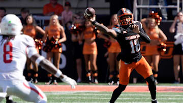 Oklahoma State Cowboys quarterback Sam Jackson V (18) throws an interception during a college football game between the Oklahoma State Cowboys (OSU) and the Houston Cougars at Boone Pickens Stadium in Stillwater, Okla., Saturday, Oct. 11, 2025.