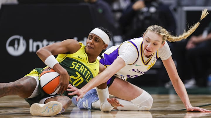Sep 1, 2025; Seattle, Washington, USA; Seattle Storm guard Brittney Sykes (20) recovers a loose ball against Los Angeles Sparks forward Cameron Brink (22) during the third quarter at Climate Pledge Arena. Mandatory Credit: Joe Nicholson-Imagn Images Sep 1, 2025; Seattle, Washington, USA; Seattle Storm guard Brittney Sykes (20) recovers a loose ball against Los Angeles Sparks forward Cameron Brink (22) during the third quarter at Climate Pledge Arena. Mandatory Credit: Joe Nicholson-Imagn Images
