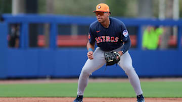 Feb 27, 2025; Port St. Lucie, Florida, USA; Houston Astros third baseman Cam Smith (90) plays his position against the New York Mets during the second inning at Clover Park. 