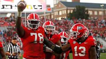 Georgia defensive lineman Nazir Stackhouse (78) celebrates after making an interception during the second half against Missouri in Athens, Ga., on Saturday, Nov. 4, 2023.