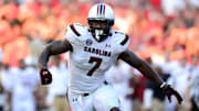 Sep 7, 2013; Athens, GA, USA; South Carolina Gamecocks defensive end Jadeveon Clowney (7) rushes the passer against the Georgia Bulldogs during the second half at Sanford Stadium. Georgia defeated South Carolina 41-30. Mandatory Credit: Dale Zanine-Imagn Images
