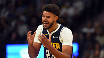Oct 25, 2025; Denver, Colorado, USA; Denver Nuggets forward Cameron Johnson (23) reacts after being called for a foul during the first half against the Phoenix Suns at Ball Arena. Mandatory Credit: Christopher Hanewinckel-Imagn Images