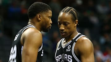 Mar 3, 2020; Charlotte, North Carolina, USA; San Antonio Spurs forward DeMar DeRozan (10) talks with forward Rudy Gay (22) during the second half against the Charlotte Hornets at Spectrum Center. Mandatory Credit: Jeremy Brevard-Imagn Images