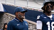 Penn State coach Terry Smith, left, a Gateway High School alum, was elevated to interim head coach after coach James Franklin was dismissed Sunday afternoon.