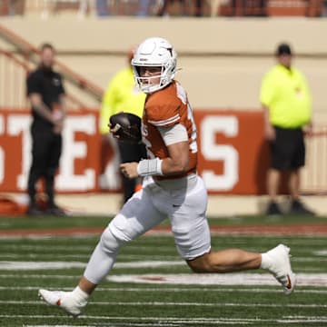 Texas Longhorns quarterback Arch Manning runs the ball during the first half against the Vanderbilt Commodores.