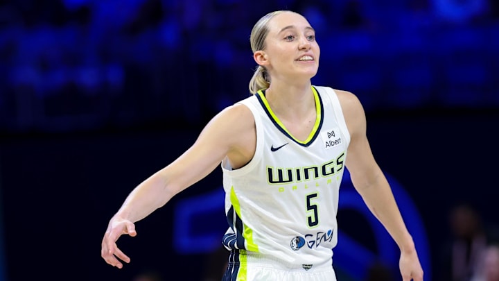 Dallas Wings guard Paige Bueckers reacts against the Phoenix Mercury. Dallas Wings guard Paige Bueckers reacts against the Phoenix Mercury.