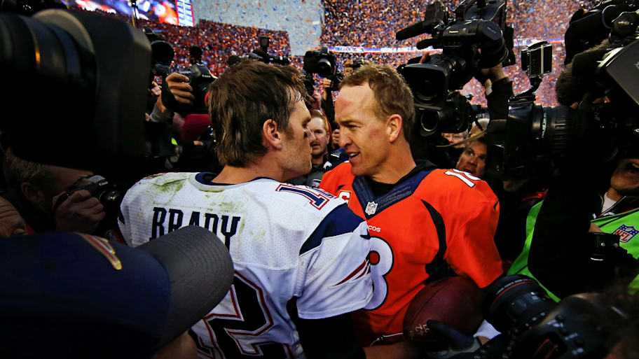 Former New England Patriots quarterback Tom Brady (12) and former Denver Broncos quarterback Peyton Manning (18) shake hands and speak after the game in the AFC Championship football game. | Kevin Jairaj-Imagn Images