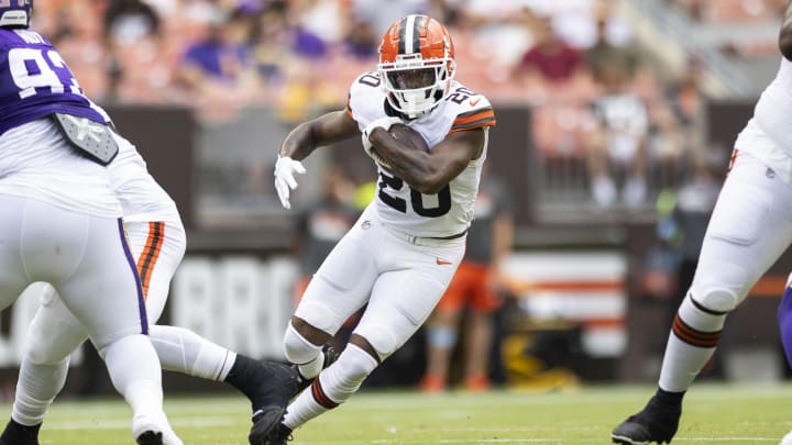 Aug 17, 2024; Cleveland, Ohio, USA; Cleveland Browns running back Pierre Strong Jr. (20) runs the ball against the Minnesota Vikings during the first quarter at Cleveland Browns Stadium. Mandatory Credit: Scott Galvin-USA TODAY Sports