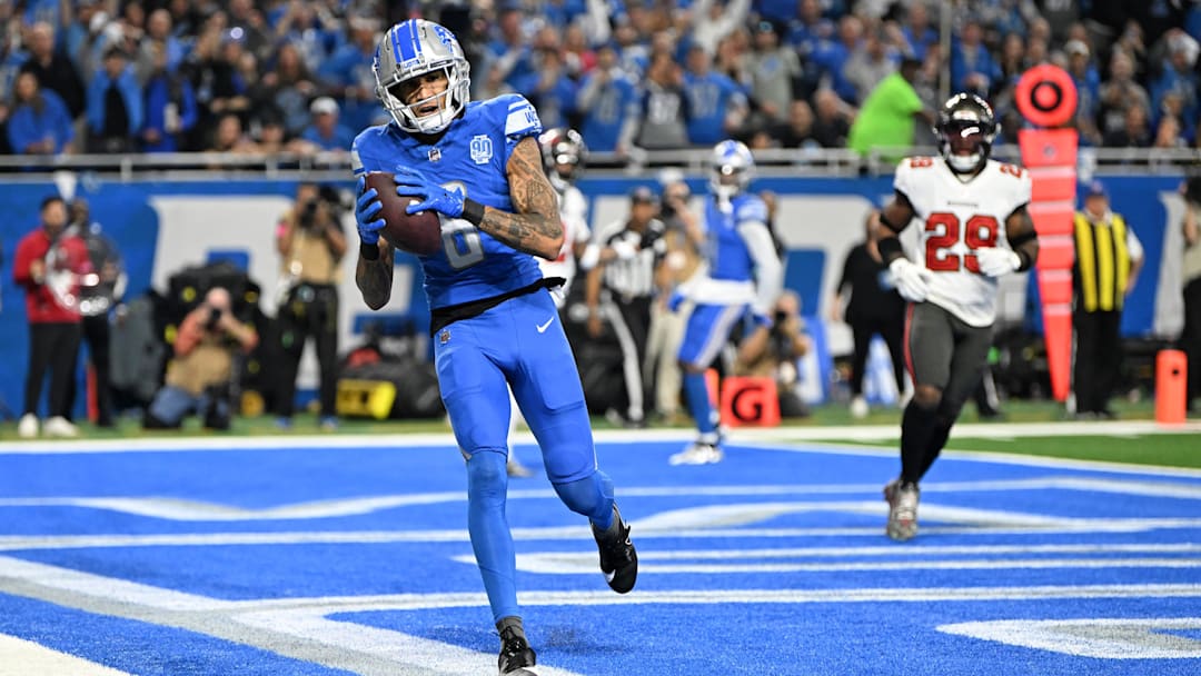 Jan 21, 2024; Detroit, Michigan, USA; Detroit Lions wide receiver Josh Reynolds (8) scores a touchdown against the Tampa Bay Buccaneers during the second quarter in a 2024 NFC divisional round game at Ford Field. Mandatory Credit: Lon Horwedel-Imagn Images