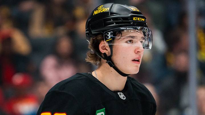 Oct 9, 2025; Vancouver, British Columbia, CAN; Vancouver Canucks forward Braeden Cootes (80) during a stop in play against the Calgary Flames in the first period at Rogers Arena. Mandatory Credit: Bob Frid-Imagn Images