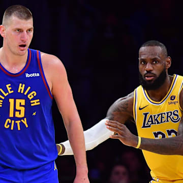 Apr 25, 2024; Los Angeles, California, USA; Denver Nuggets center Nikola Jokic (15) controls the ball against Los Angeles Lakers forward LeBron James (23)  during the second half in game three of the first round for the 2024 NBA playoffs at Crypto.com Arena. 