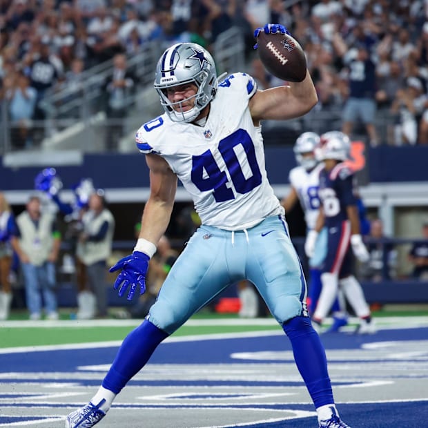 Dallas Cowboys running back Hunter Luepke reacts after scoring a touchdown against the New England Patriots 