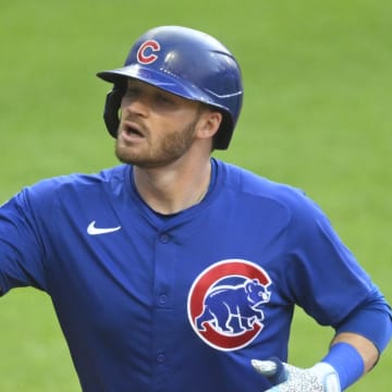 Chicago Cubs left fielder Ian Happ (8) celebrates his two-run home run in the second inning against the Cleveland Guardians at Progressive Field on Aug 14.