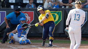 Michigan Wolverines utility Maddie Erickson (7) hits the pitch of UCLA Bruins starting pitcher/relief pitcher Addisen Fisher (13) Saturday, May 10, 2025, during the Big Ten softball tournament championship game at Purdue University’s Bittinger Stadium in West Lafayette, Indiana. Michigan Wolverines won 2-0.